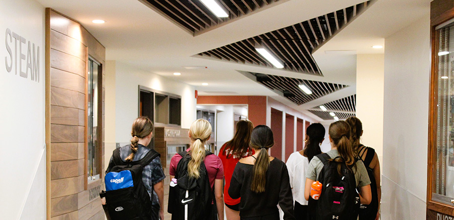 incoming high school students getting a tour of the building.