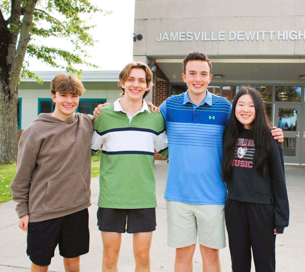 Patrick Duca, Lucas Chiorini, Brian Tollar and Abigail Feng pose for photo. 