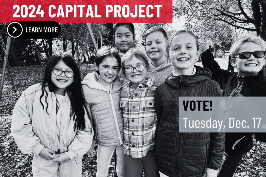 Black and white photo of elementary students posing for a photo on the playground. Graphic text reads 2024 Capital Project, Learn More. Vote! Tuesday, Dec. 17