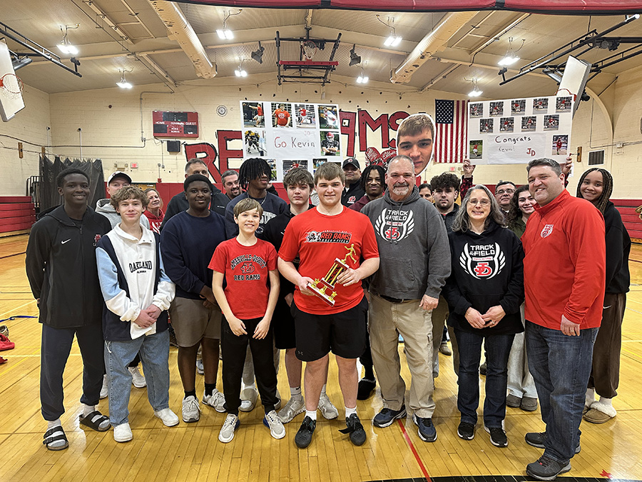 NewsChannel 9 Syracuse's Student-Athlete of the Week: Jamesville-Dewitt’s Kevin Vigneault poses with family, coaches, and friends.