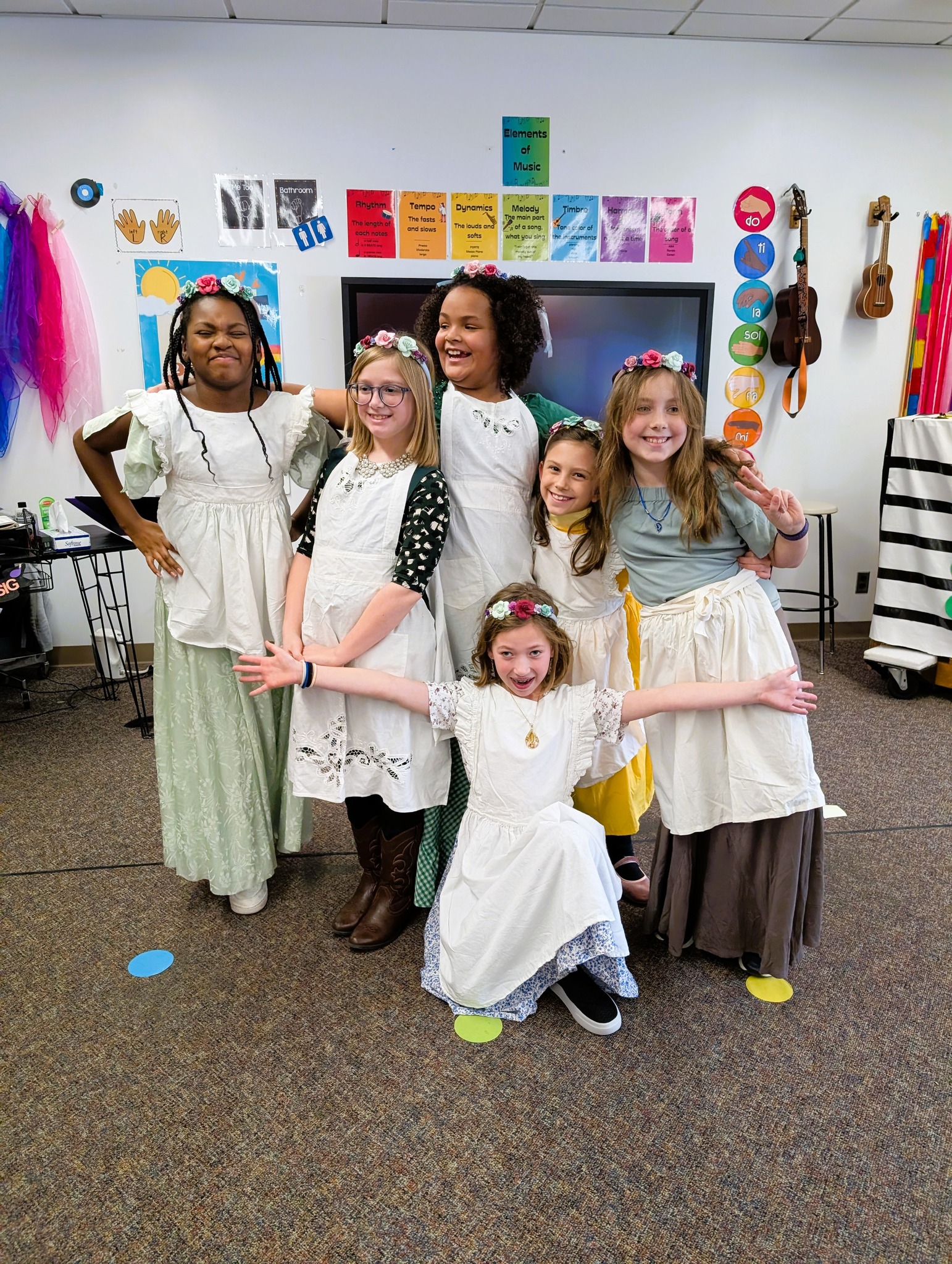 Students pose for photo in Thwacked musical costumes.