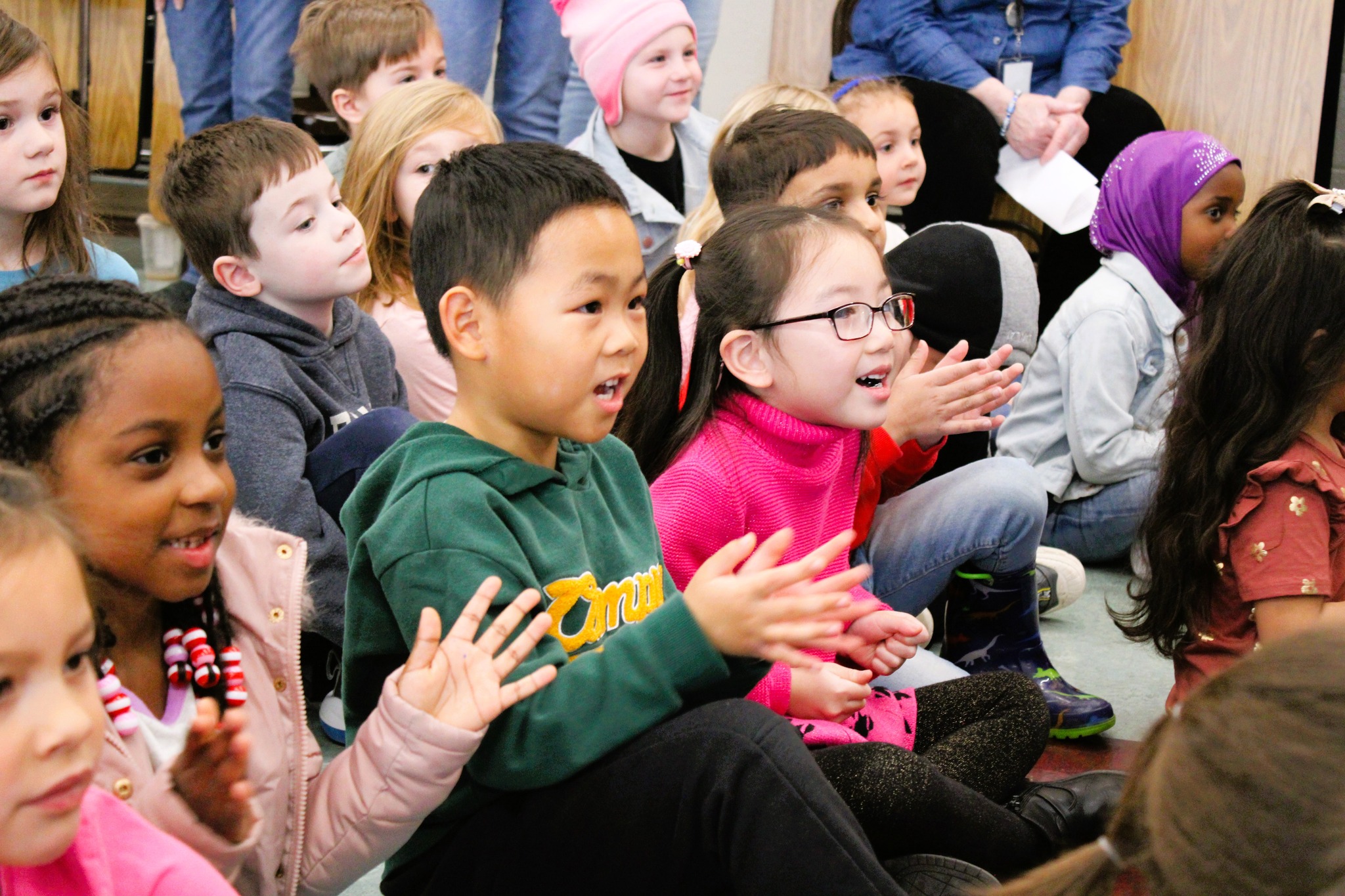 Tecumseh students clap during assembly.